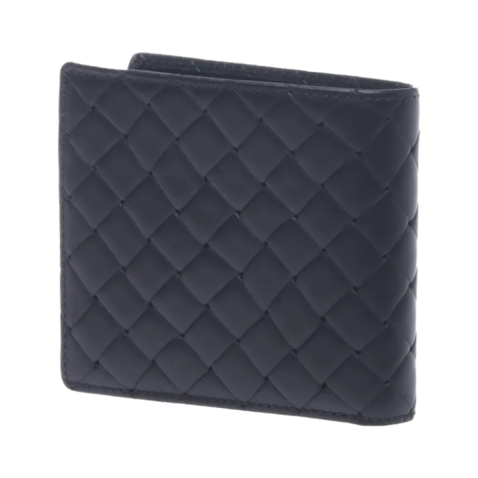 Wallet in black woven print leather