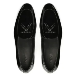 Zwarte gelakte loafers met een clutch.Dit product valt klein uit.